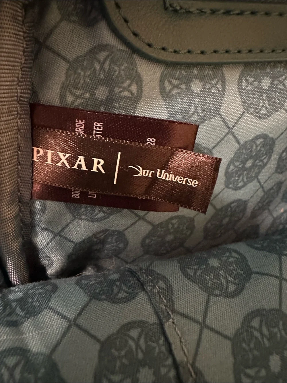 Our Universe Disney Pixar Brave DunBroch Family tapestry mini backpack.
